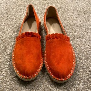 Orange ruffle shoes